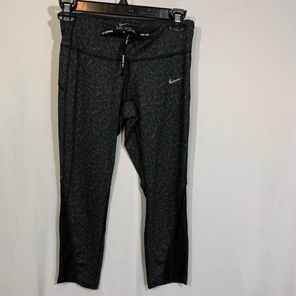 NIKE woman’s dry fit running leggings. Size XS. Black and dark gray. New conditi
